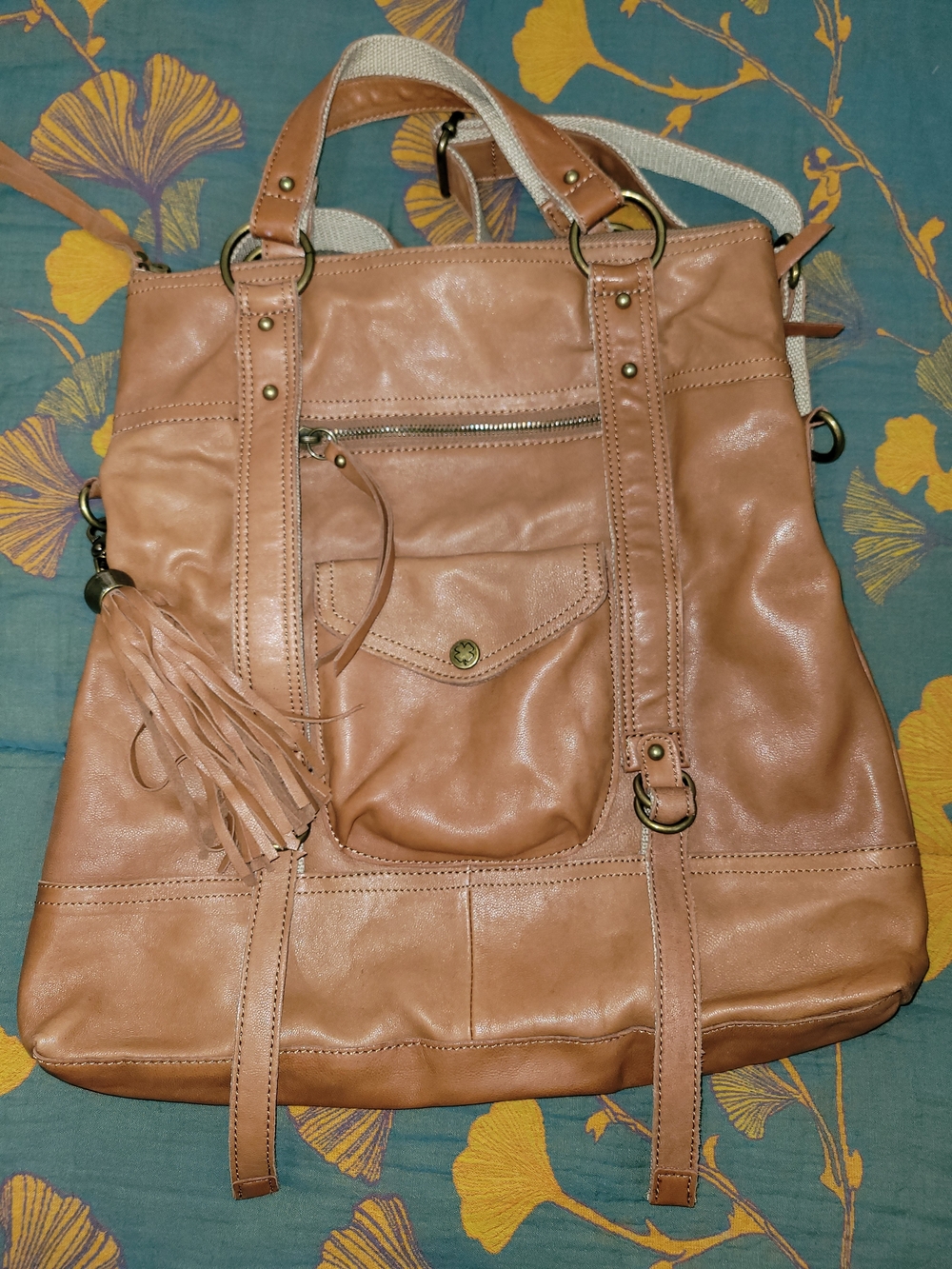 Lucky Brand Tan Convertible, Crossbody/Backpack with Tassel Detail.